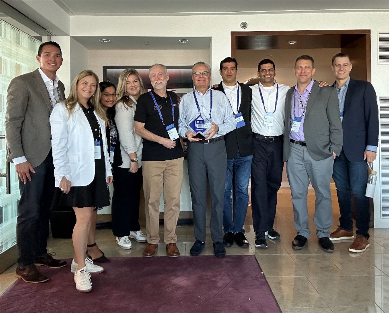 Team RateGain receiving its Expedia Elite Partner Award